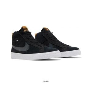Nike SB Zoom Blazer Mid
Premium Black and White High-Top Sneakers